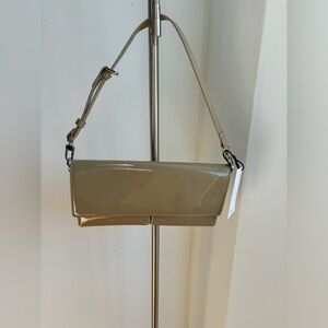 Patent leather effect double compartment bag